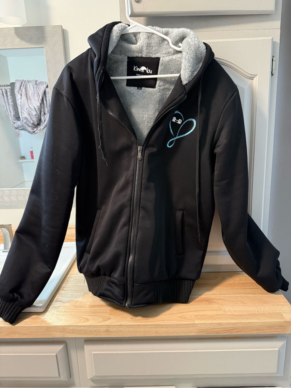 Kiwi Lou Black Jacket with Light Gray Sherpa Lining